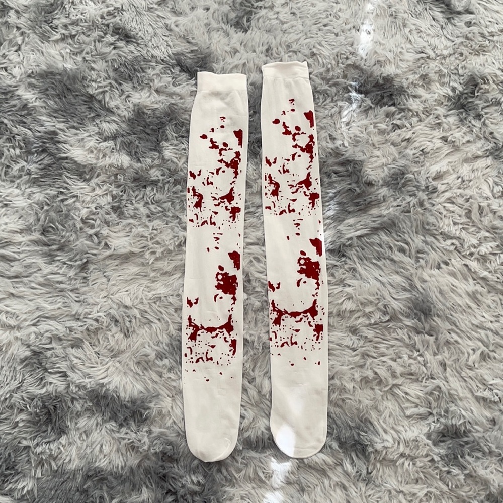 Red splatter knee high socks.